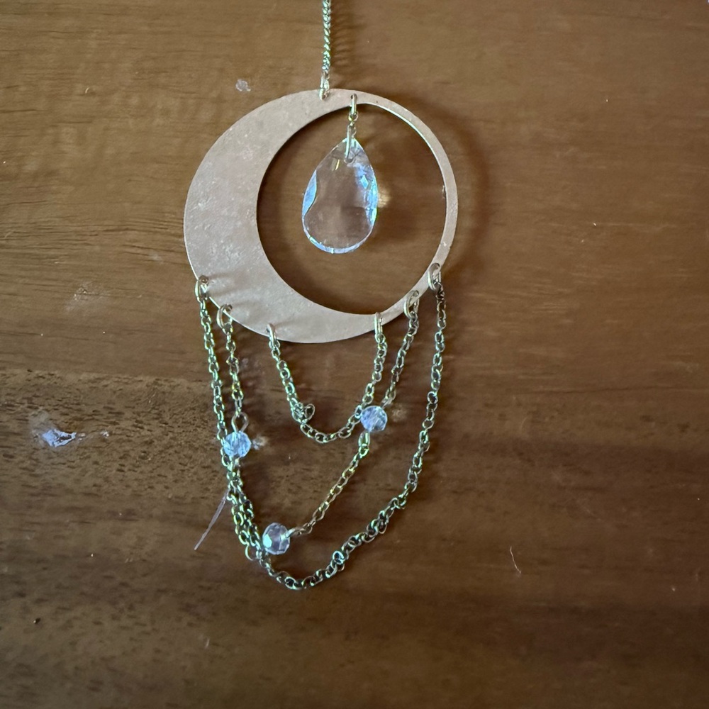 Elegant Gold and Clear Teardrop Pendant